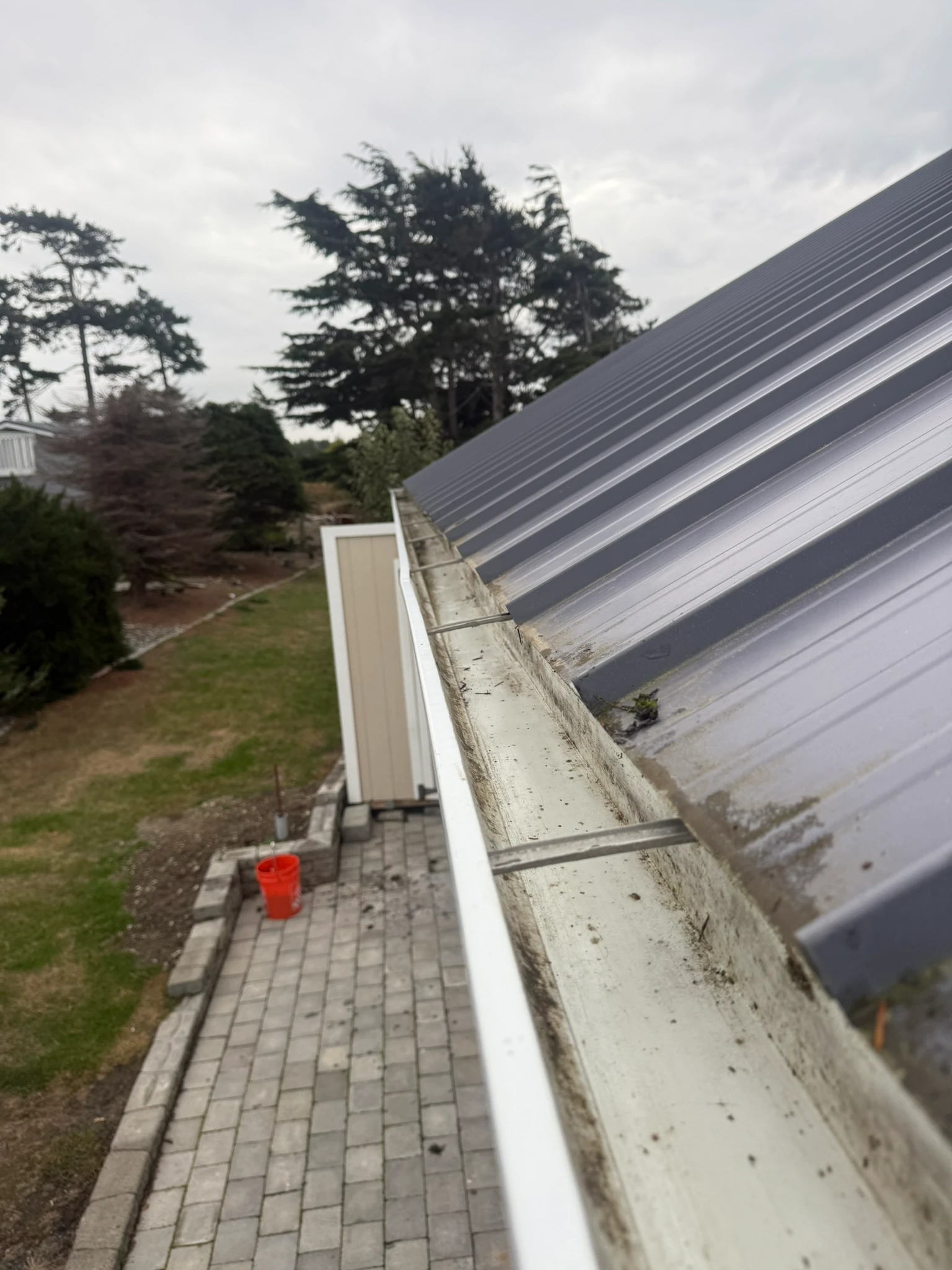 Clean gutter channel after Rainwise upgrades